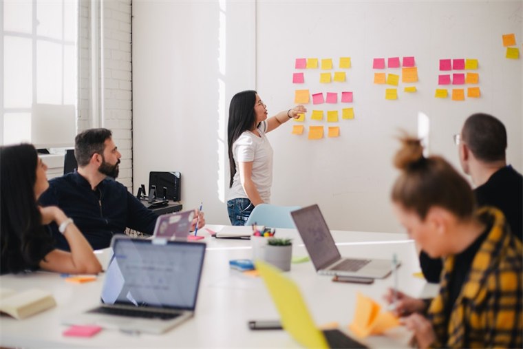 Team meeting with sticky notes