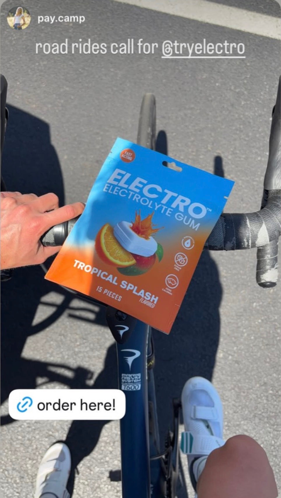 Cyclist holding Electro Gum pack