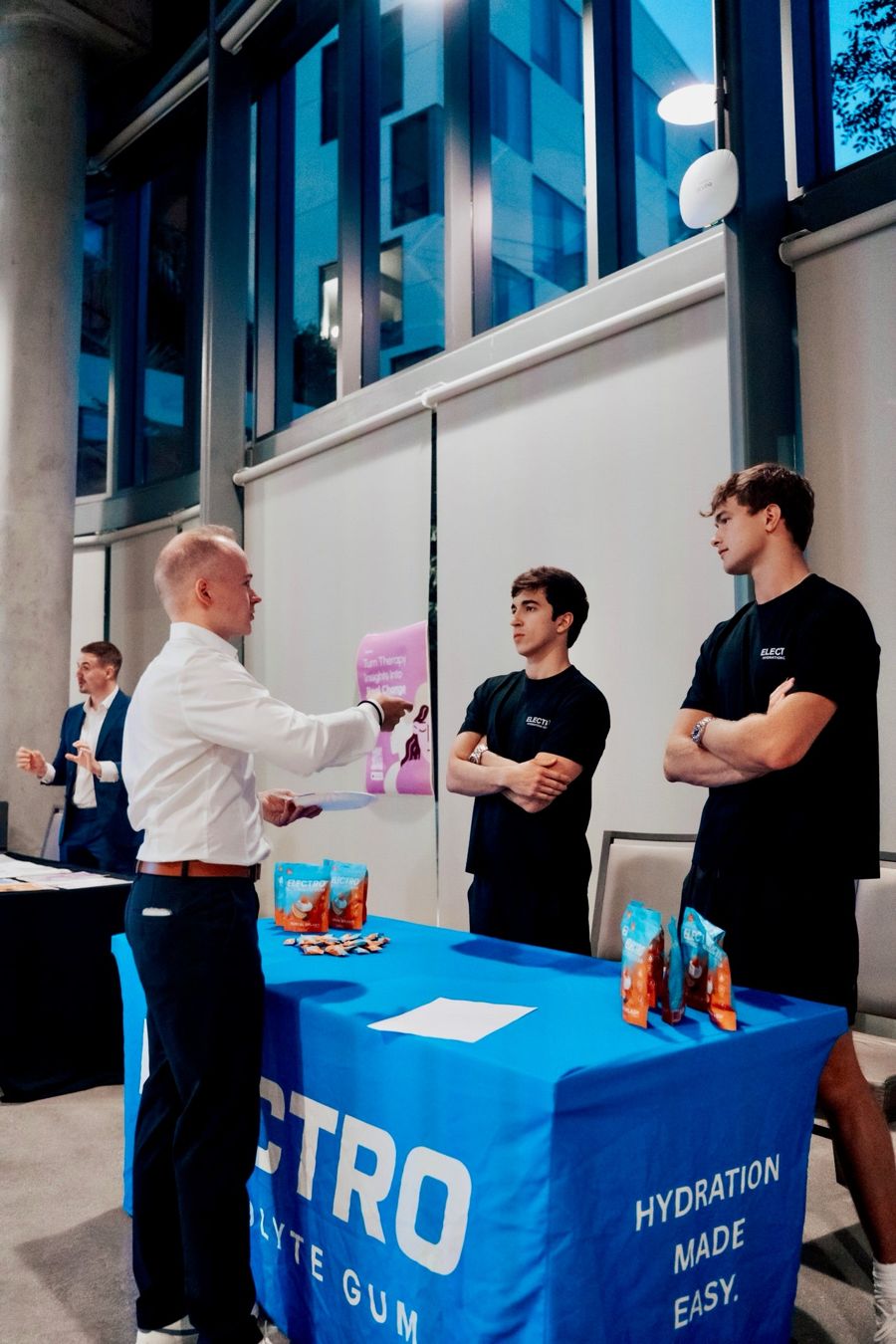 Electro interns at an event booth